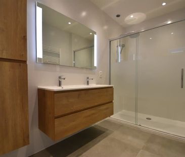 Gerenoveerd gelijkvloers appartement met ruim terras - Foto 5