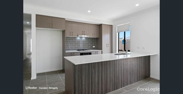 Modern Family Living in the Heart of Gregory Hills - Photo 1