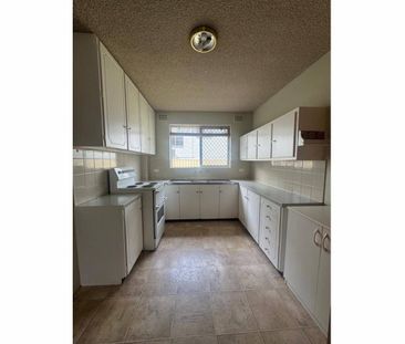 TWO BEDROOM GROUND FLOOR UNIT - Photo 1
