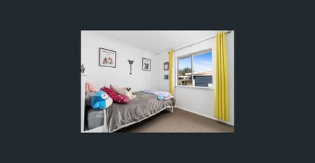 Family home with multiple living zones and large fenced yard - Photo 2