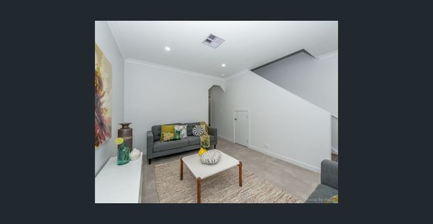 Modern 2 Bedrooms Plus Study Town House In Sought After Location - Photo 1