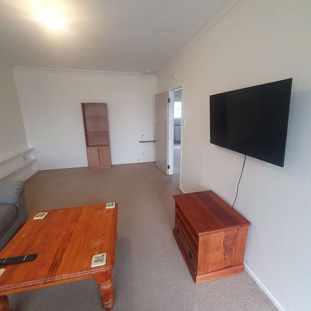 Tidy two bedroom unit - semi furnished - Photo 1