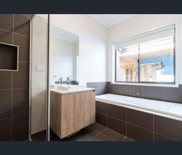 Spacious Family Living with Multiple Living Zones - Photo 4