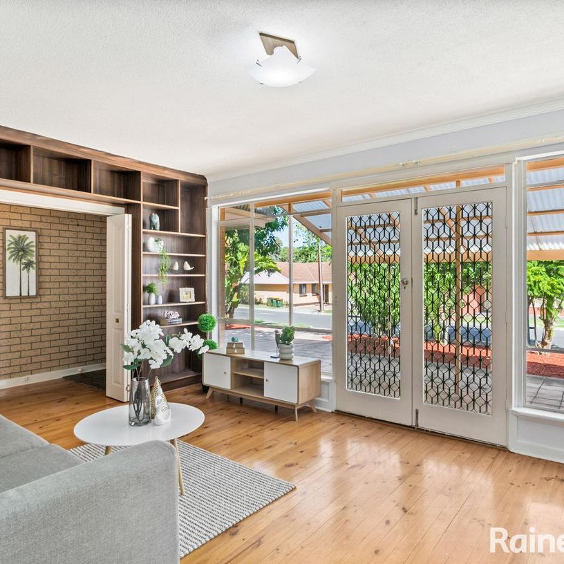 Solid Brick Home with Large Living Areas and Gorgeous Eastern Hill Views - Photo 1