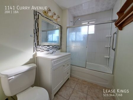 2 Bed 1 Bath Single Family Home w Off Street Parking and Fenced in Yard!! - Photo 4