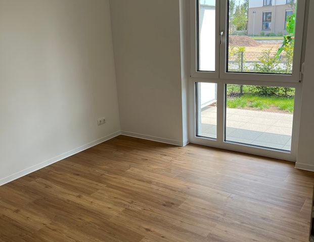 Wohnen in mit eigenem Gartenanteil - Tolle 2-Zimmer-Neubauwohnung mit Terrasse - Photo 1