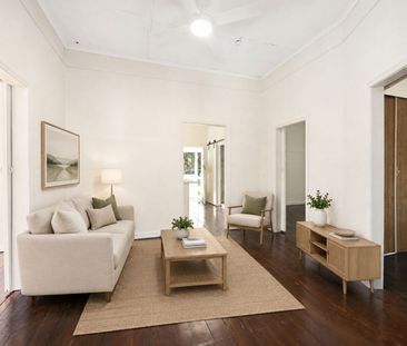 Freshly Renovated Character Home in Sought-After Bardon - Photo 1