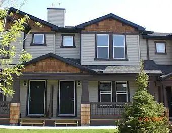 Conveniently Located 3 Bedrooms + 2 Parking Family Town Home in Panorama Hills — 3 Bedrooms Townhouse - Photo 1
