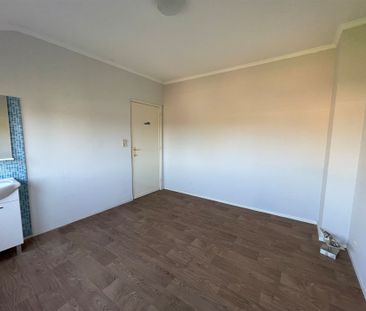 Charmante bel-etagewoning met zuidgerichte tuin, garage en bureau i... - Photo 2