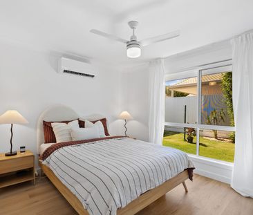 Fully Renovated Coastal Home with Outdoor Entertaining in Prime Wel... - Photo 5