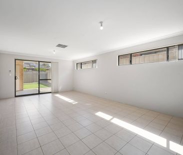 Comfortable Family Home with Space and Convenience - Photo 1