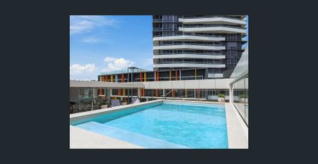 Stylish Two-Bedroom in Prestigious Signature Building - Photo 4