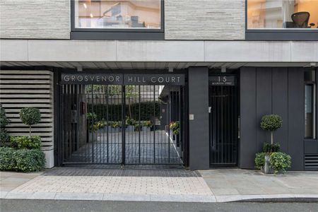 A lateral three bedroom apartment with a lift and porter in Mayfair. - Photo 3