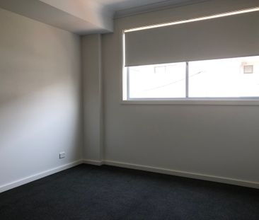 Modern two bedroom unit - 20% below market rent - Photo 4