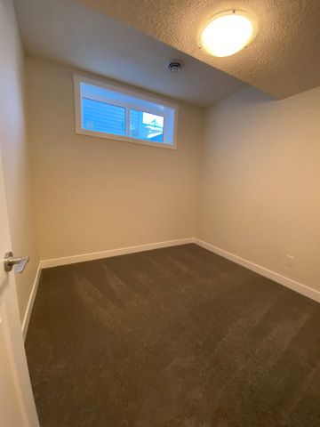 Brand-New 2 Bedroom Basement Suite in Wolf Willow – Private Entrance - Photo 2