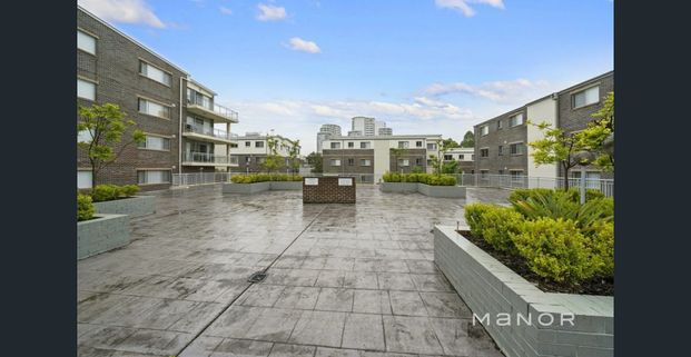 Spacious 2-Bedroom + Study Apartment with Double Garage, Lift Access & Resort-Style Amenities in Prime Castle Hill Location - Photo 1