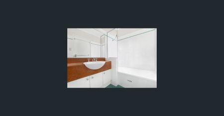 TOP FLOOR SPLIT LEVEL APARTMENT - Photo 5