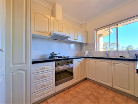 SECURITY AND SPACIOUS TWO BEDROOM UNIT - UPGRADED - Photo 5