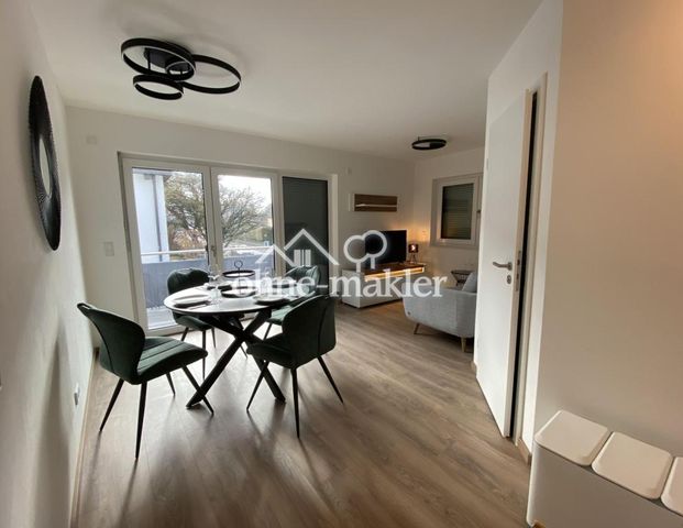 Erstbezug: möblierte 2-Zi-Neubauwohnung. inkl. Tiefgaragenstellplatz in München-Allach - Photo 1