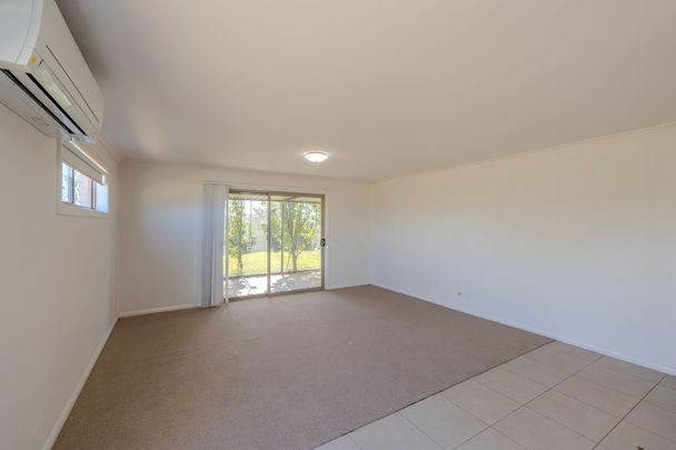 Comfortable 4-Bedroom Home with Large Outdoor Space - Photo 1