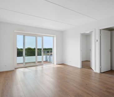 Skøn lejlighed med udsigt og stor fælles tagterrasse - Photo 3