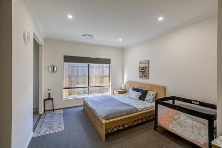 Spacious Family Home with Large Yard in Logan Reserve - Photo 5