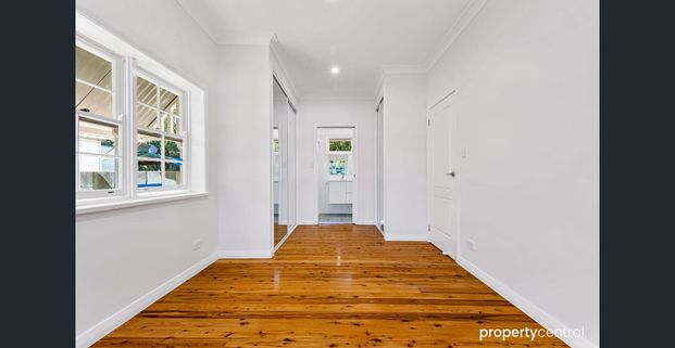 Move-In Ready Modern Family Home with Backyard in Peaceful Blaxland Location - Photo 1