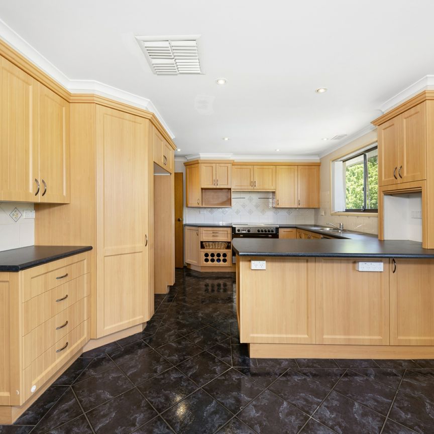 Stunning Three Bedroom Family Home with Pool, Solar and Large Gardens in a Prime Location! - Photo 1