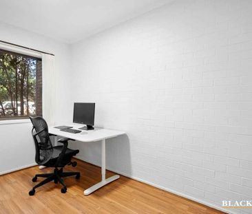 Convenient ground floor unit - Photo 4