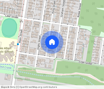 VERSATILE LAKE ALBERT HOME WITH SHEDS AND STUDY - Photo 1