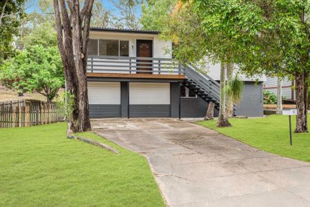 Perfect Family Living: Light-Filled Home with Fenced Yard - Photo 2
