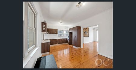 Open the Door to Style, Security, and Location in Woodville South - Photo 5