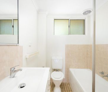 Neat and Tidy two-bedroom unit with parking - Photo 2