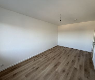 Modernisierte und helle 3-Zimmerwohnung mit Balkon, Wannenbad und G... - Foto 6