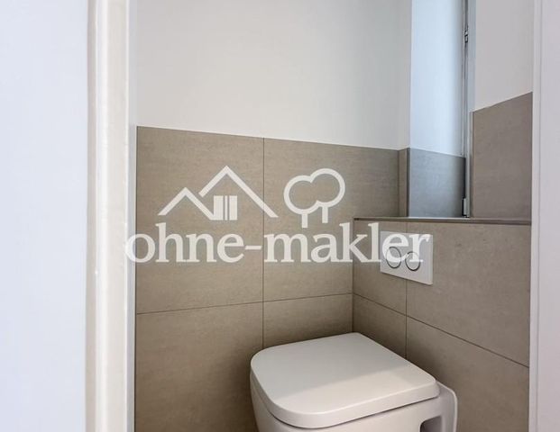 Erstbezug nach Kernsanierung: Moderne 1,5-Zi.-EG-Wohnung mit Küchenzeile und Fußbodenheizung - Foto 1