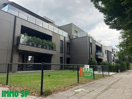 Volledig afgewerkt gelijkvloers appartement met tuintje. - Foto 4