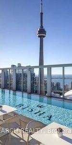 Luxurious bisha hotel rooftop pool + den! - Photo 4