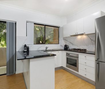 Stylish Apartment Offering Comfort & Convenience - Photo 1