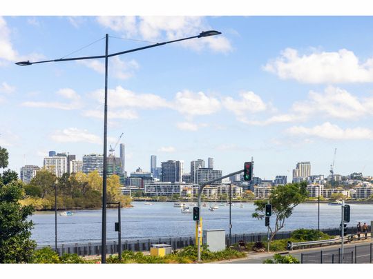 Semi furnished 2 bed unit with river view - Photo 1