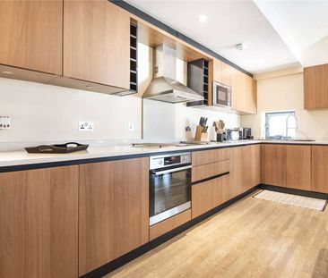 A beautifully presented two bedroom apartment in the heart of the c... - Photo 5