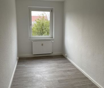Einziehen und Wohnen… Ihre gemütliche 3-Zimmer-Wohnung in Sangerhau... - Foto 1