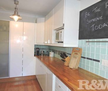SPACIOUS TWO BEDROOM UNIT WITH COURTYARD - Photo 1