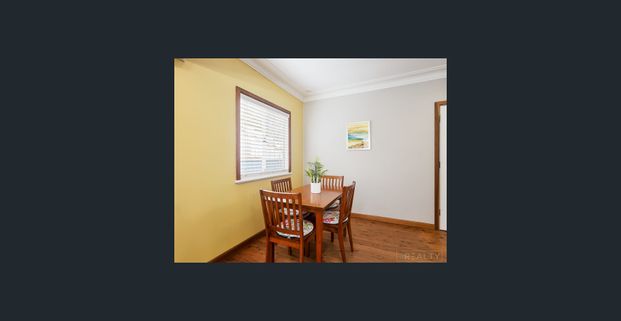 Comfortable 3 Bedroom Home Near the Lake - Photo 1