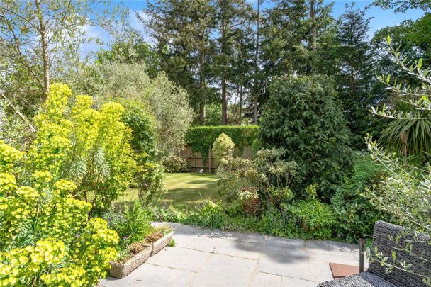 A handsome detached family home providing beautifully presented accommodation and situated on a mature, landscaped plot approaching 0.5 acre located under a mile from the village centre. - Photo 1