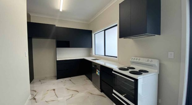 Stylish new two-bedroom - Photo 1