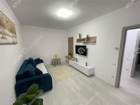 De inchiriat apartament modern cu 2 camere decomandate si balcon in zona Deventer din Sibiu - Fotografie 3