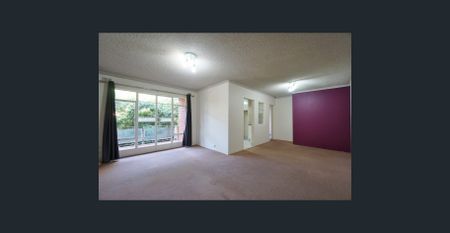 Spacious Unit in a Convenient Location with Parking - Photo 2