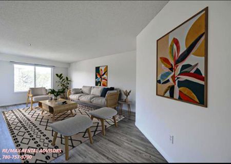 GREAT 2 BED, 1 BATH APARTMENT WITH OUTDOOR PARKING STALL IN THE COMMUNITY OF PARKDALE - Photo 4