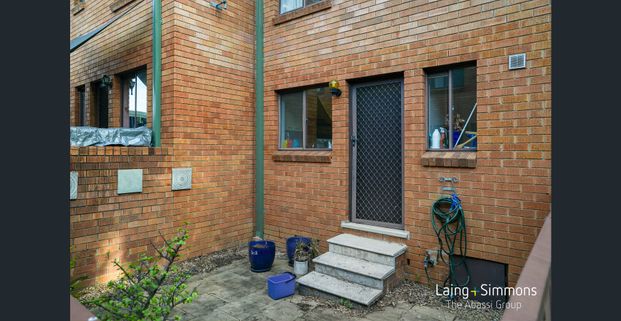 Convenient, Cozy and Comfortable Townhouse! - Photo 1