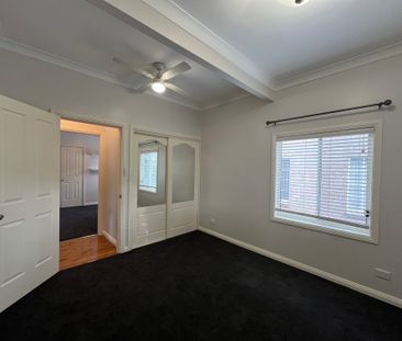 Three Bedroom Home with Sunroom - Photo 2